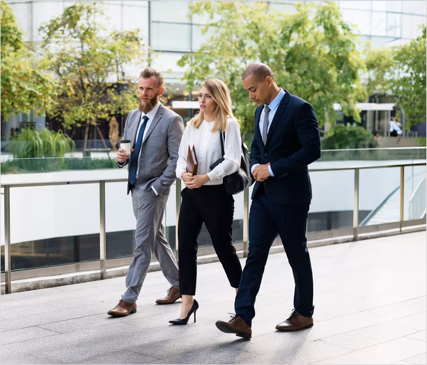 Team walking together outside an office